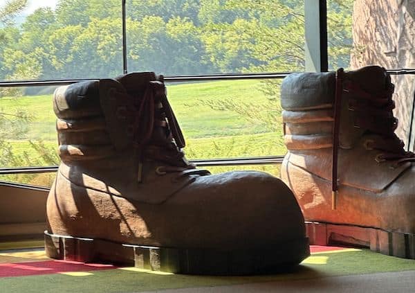 Sculpture of large (human sized) hiking boots on Epic's campus.